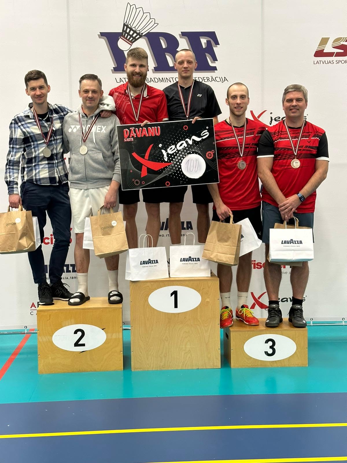 Doubles podium at a Latvian Badminton Federation event